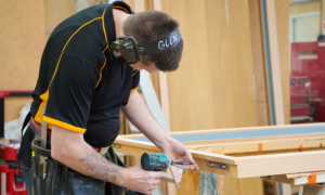 PK Joinery staff member taking care to accomodate natural timber movement while crafting joinery
